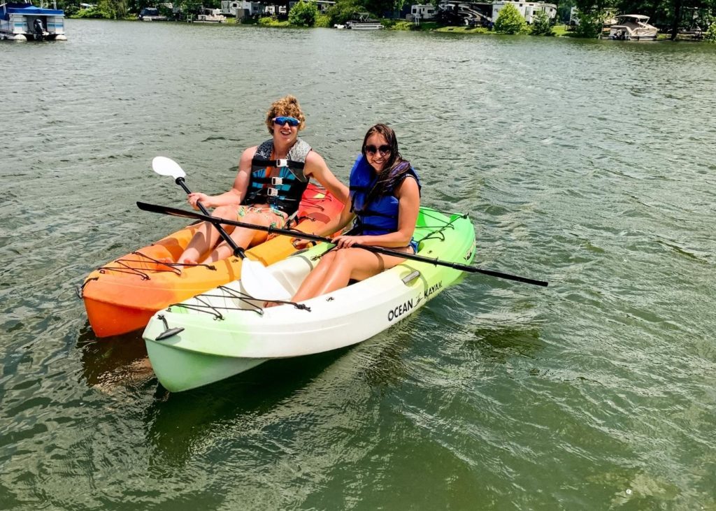 Two people kayaking on Atwood Lake