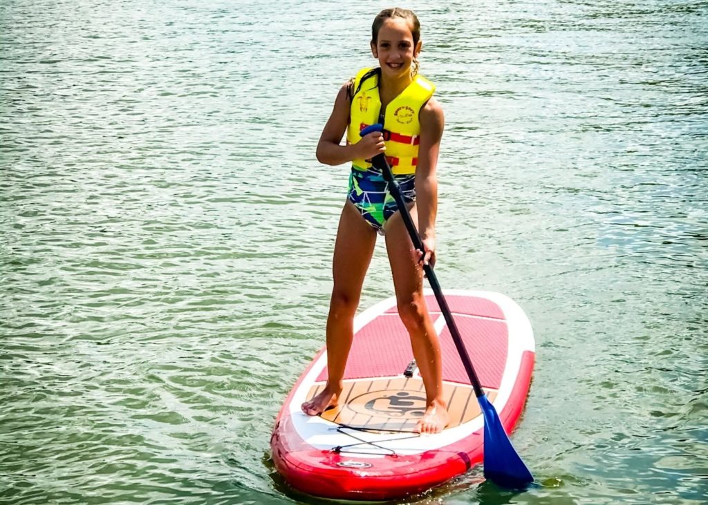 Girl on paddle board at Atwood Lake