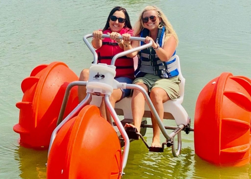 Two women on an aqua cycle at Atwood Lake