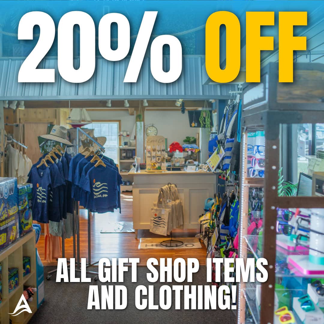 Gift shop sale sign advertising 20 percent off clothing
