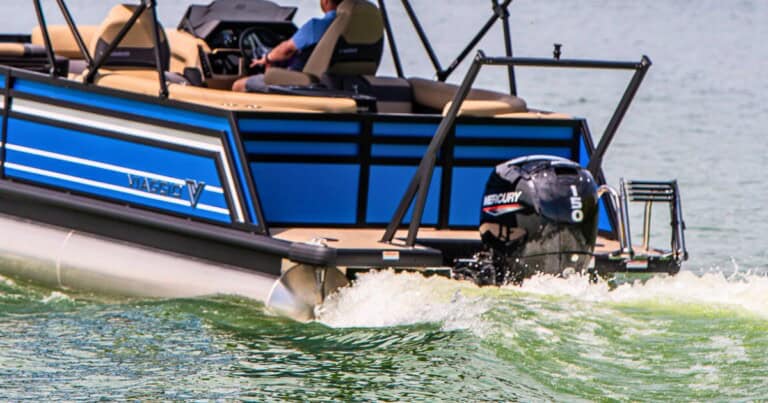 Blue Viaggio pontoon boat with Mercury engine on water.