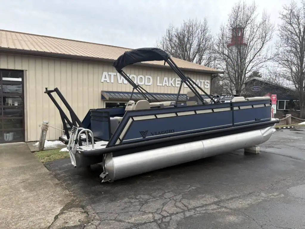 Pontoon boat outside Atwood Lake Boats.
